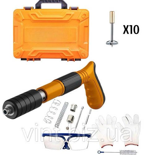 Пневматичний пістолет для забивання цвяхів ручного типу у кейсі.